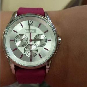 Coach Women’s pink sport band watch